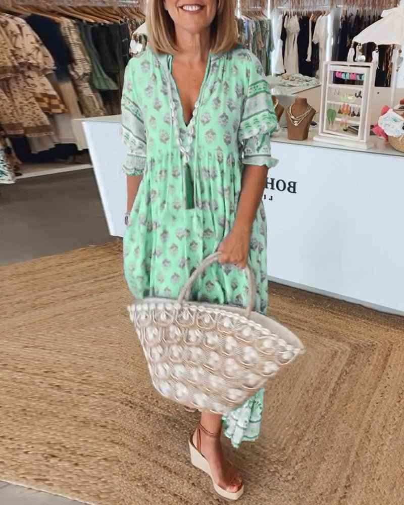 MANA | MIDILANGE CHIQUE FLORAL JURK MIT V-AUSSCHNITT