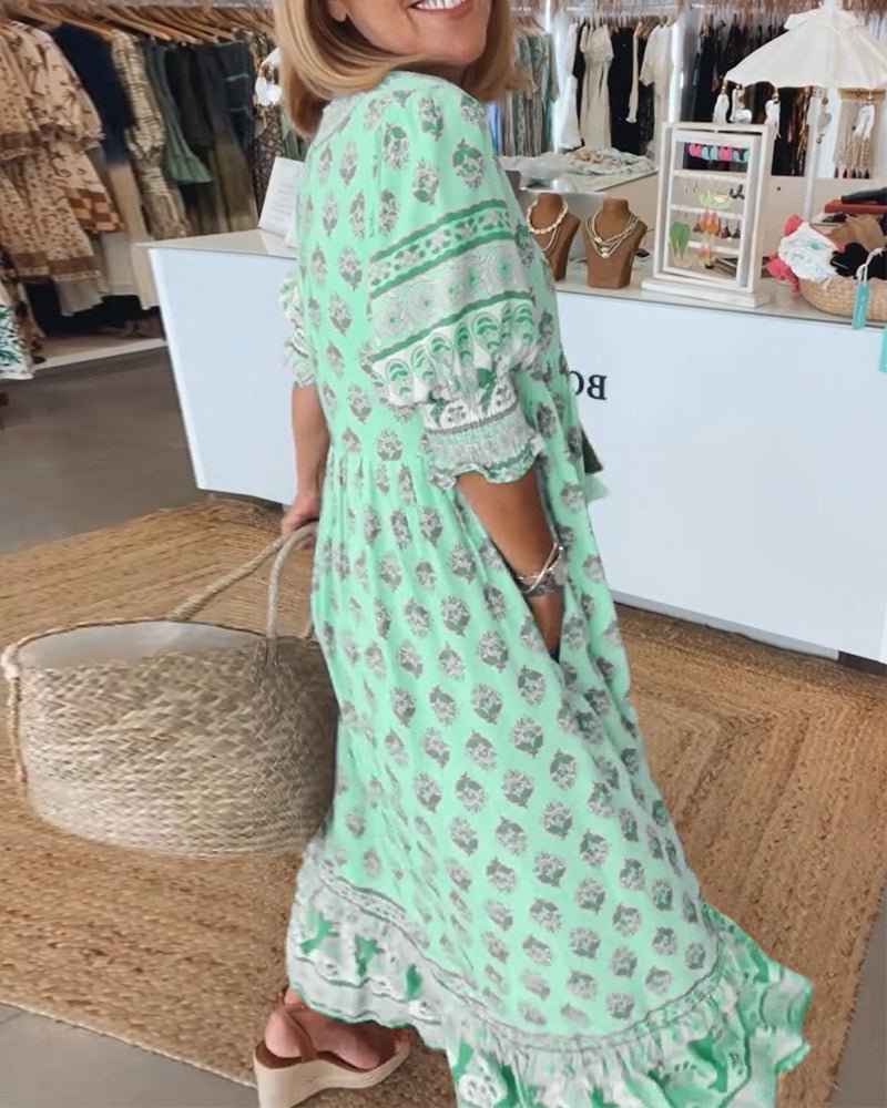 MANA | MIDILANGE CHIQUE FLORAL JURK MIT V-AUSSCHNITT