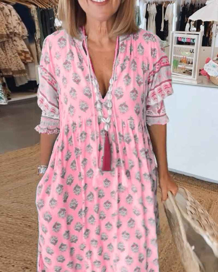 MANA | MIDILANGE CHIQUE FLORAL JURK MIT V-AUSSCHNITT