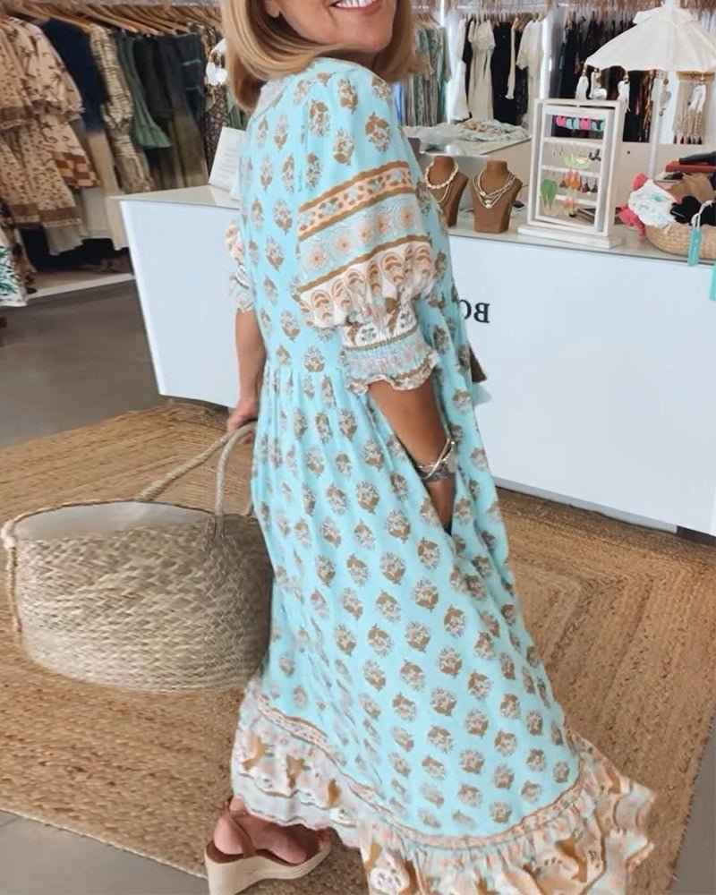 MANA | MIDILANGE CHIQUE FLORAL JURK MIT V-AUSSCHNITT